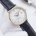 Longines automatic wristwatch, white dial, dark blue leather strap, gold-tone case.