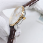 Longines wristwatch with gold-tone case and brown leather strap, crown at side.