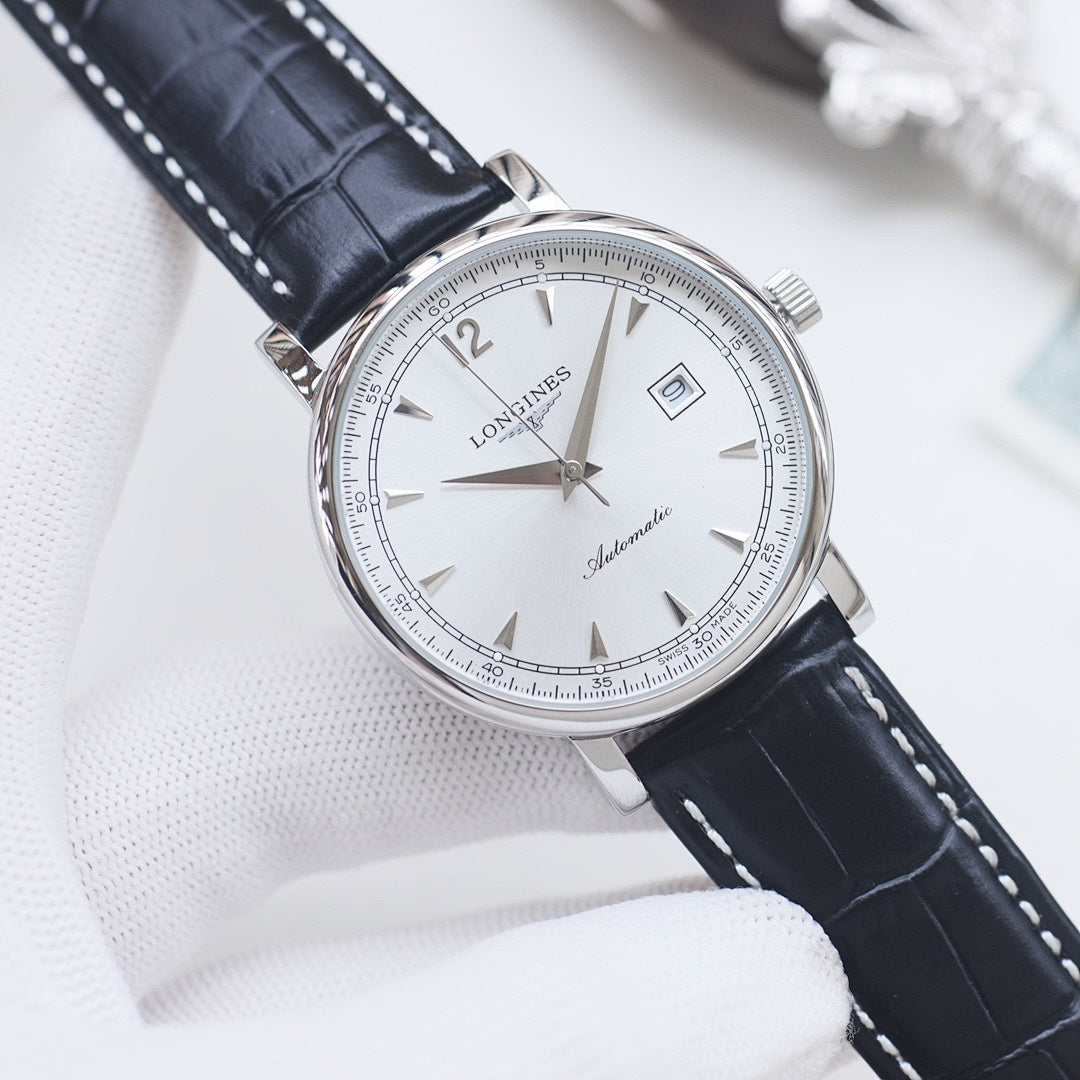 Longines automatic wristwatch, white dial, black leather strap, silver round case.