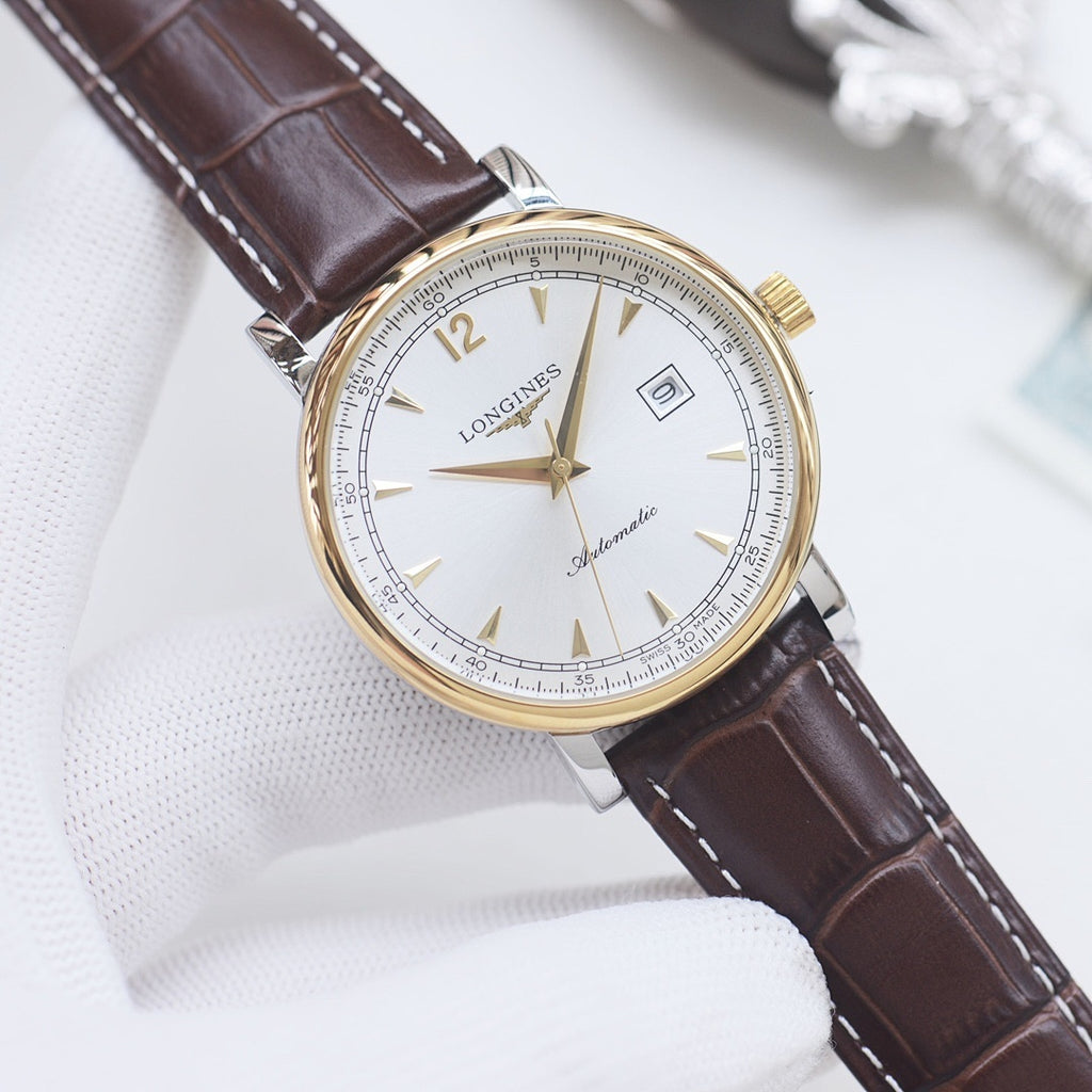 Longines automatic wristwatch, white dial, brown leather strap, gold-tone case.