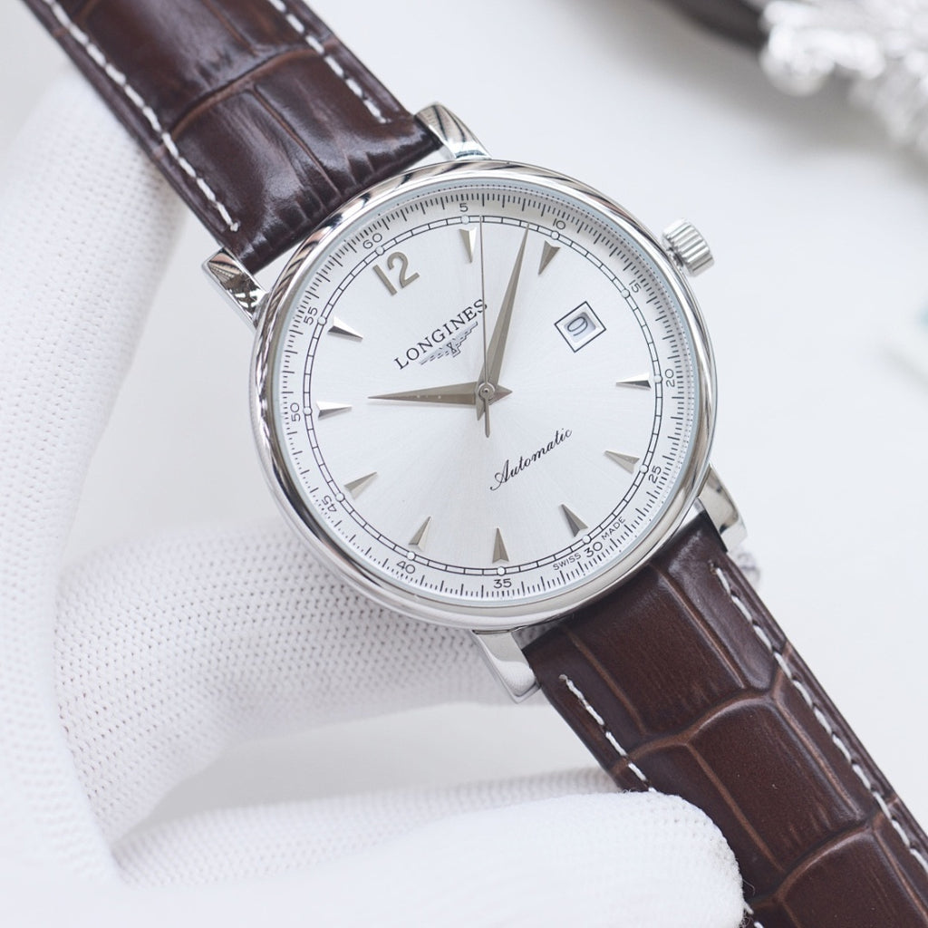 Longines automatic wristwatch, white dial, brown leather strap, silver round case.