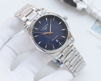 Longines two-tone watch with dark blue dial and silver bracelet, crown at 3