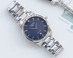 Longines two-tone watch with dark blue dial and silver bracelet, polished bezel