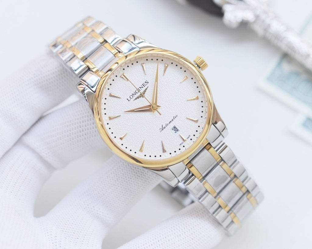 Longines watch with champagne dial and silver/gold link bracelet