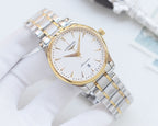 Longines watch with champagne dial and silver/gold link bracelet