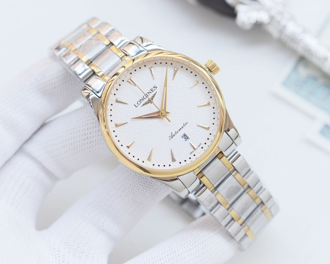 Longines watch with champagne dial and silver/gold link bracelet