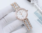 Longines watch with rose-gold case and shimmering bezel, white dial and metal link bracelet
