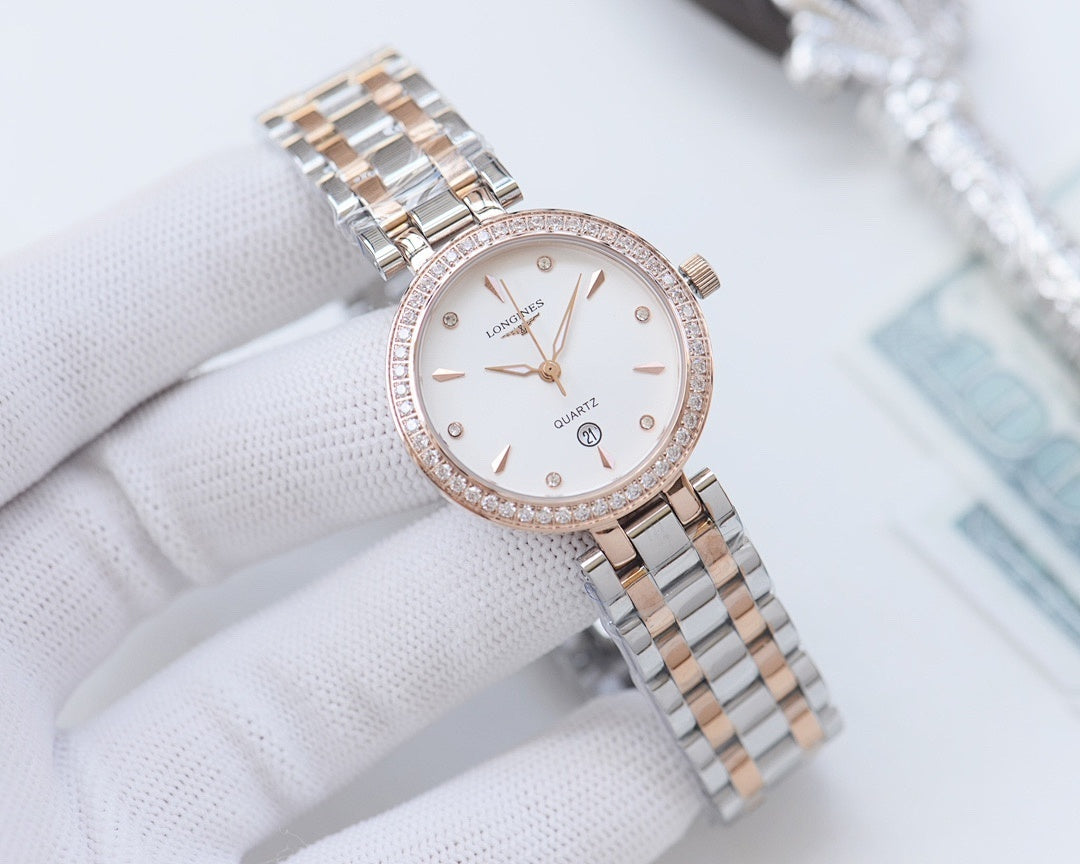 Longines watch with rose-gold case and shimmering bezel, white dial and metal link bracelet