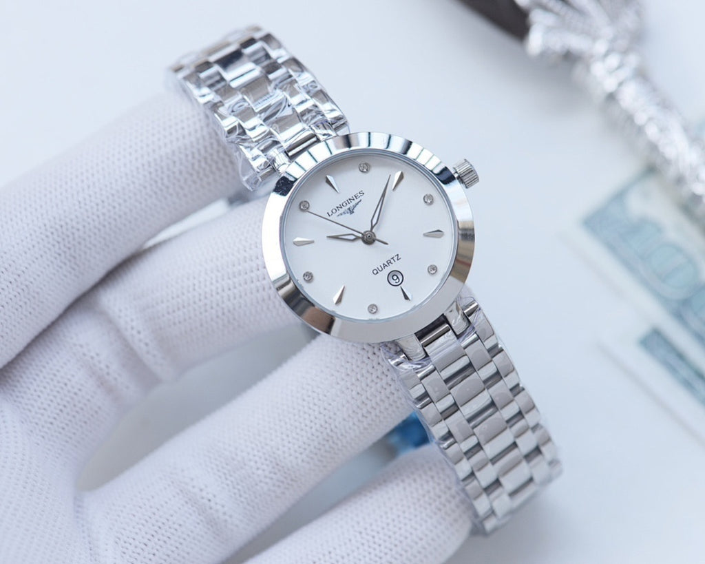 Longines watch with silver-toned case and metal link bracelet, white dial with three hands