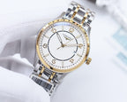 Longines watch with white dial and gold-accent hands on metal bracelet.