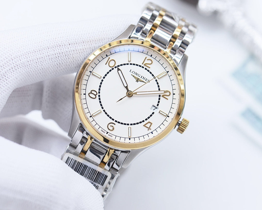 Longines watch with white dial and gold-accent hands on metal bracelet.