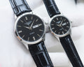 Longines quartz watches with black dials, black leather straps, and silver cases