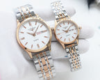 Longines quartz watches with white dials, steel bracelets, and rose gold cases