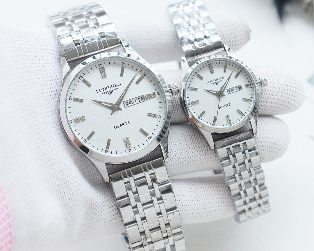 Longines quartz watches with white dials, steel bracelets, and silver cases