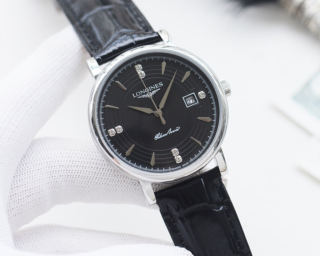 Round watch with silver case, dark dial, and black leather strap