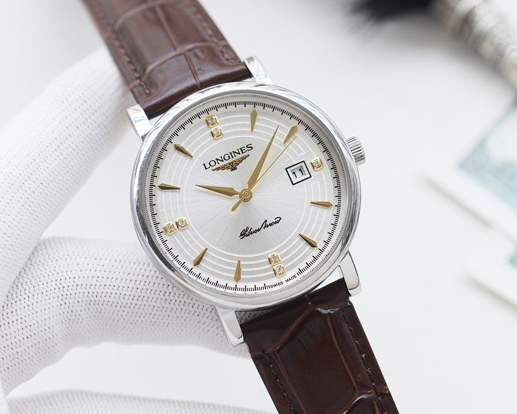Round watch with silver case, white dial, and brown leather strap