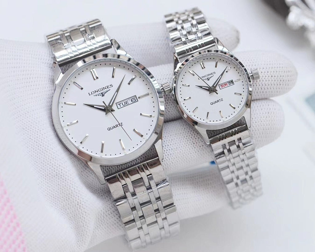 Longines watches with silver-tone cases, white dials, metal bracelets, quartz