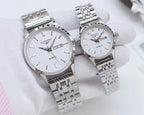 Longines watches with silver-tone cases, white dials, metal bracelets, quartz