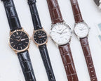 Longines watches with leather straps: black and brown, dark and white dials, round cases