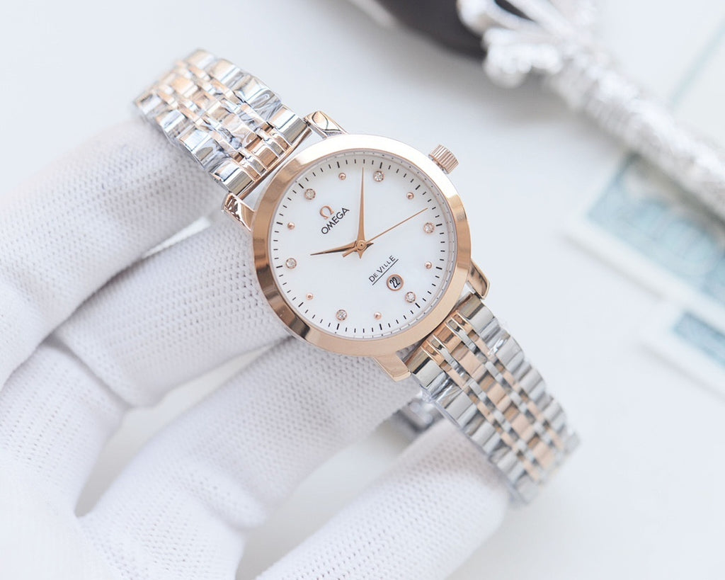 Longines two-tone metal watch with white dial and alternating blue insets on bracelet