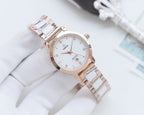 Longines two-tone wristwatch with white dial, gold-tone case rim, and link bracelet