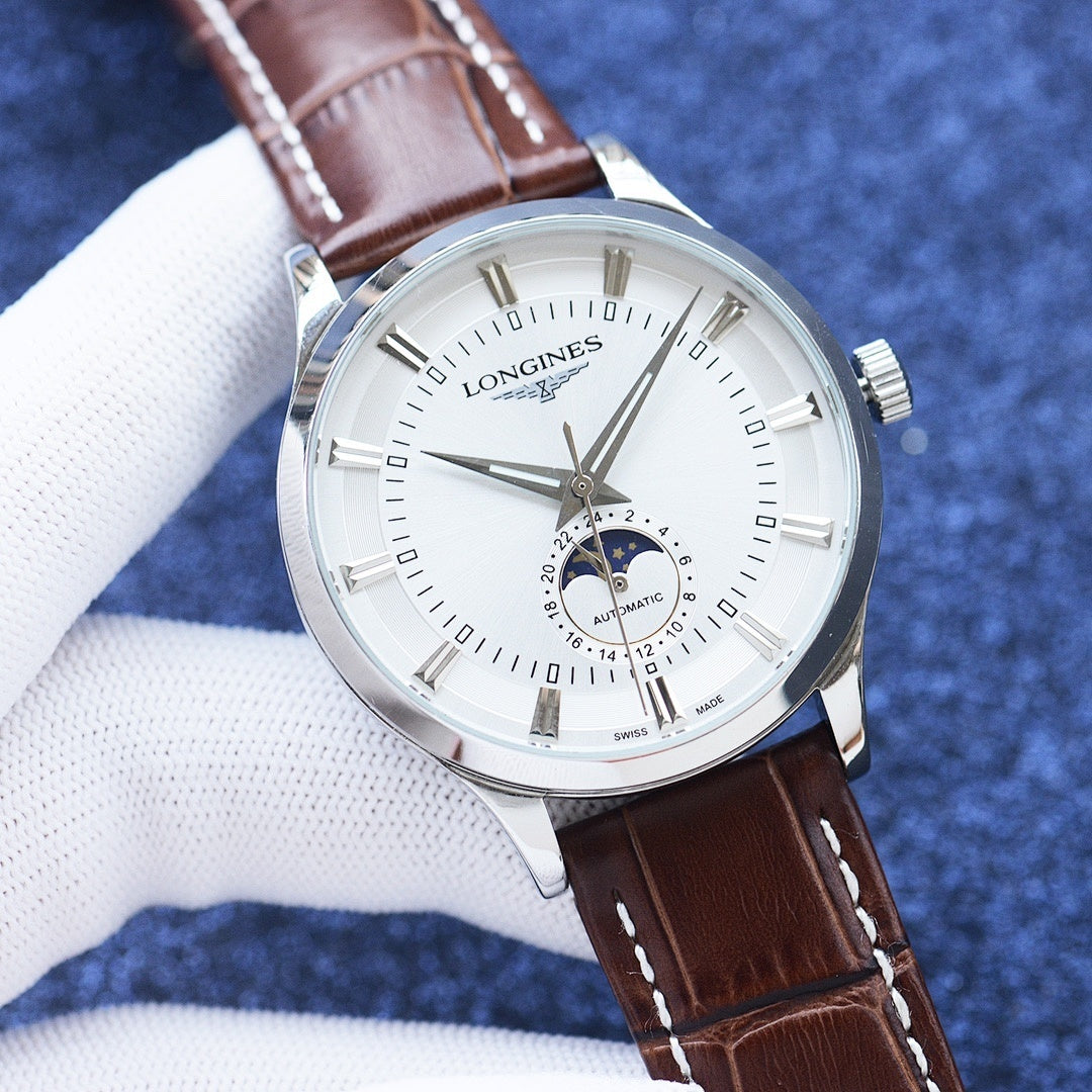 Longines watch with silver case, white dial, brown leather strap, and date subdial.