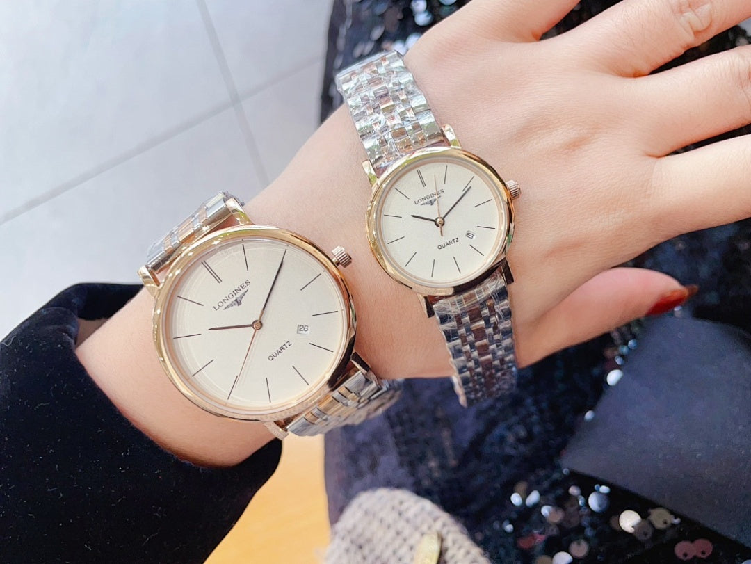 Two Longines quartz watches with silver link bracelets, white dials, rose-gold style cases