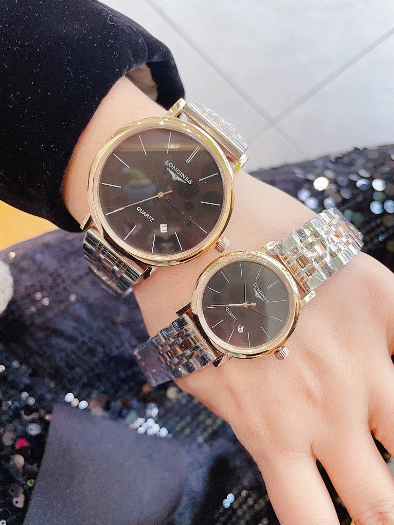 Longines quartz watch set with dark brown dial and silver link bracelet, round case