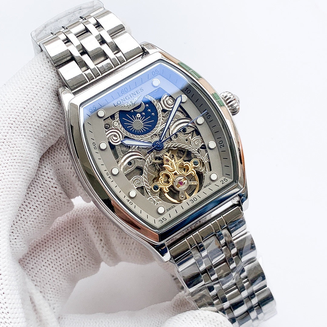 Longines watch with stainless steel bracelet and blue skeleton dial, gold-toned gears.