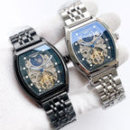 Longines watch pair with stainless steel bracelets, blue skeleton dials and gold gears.