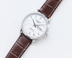 Longines watch with white dial and brown leather strap, round silver-tone case
