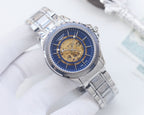 Longines skeleton watch, silver-tone case, blue dial, gold-toned movement, metal bracelet