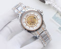 Longines skeleton watch, silver-tone case, white dial, gold-toned movement, metal bracelet