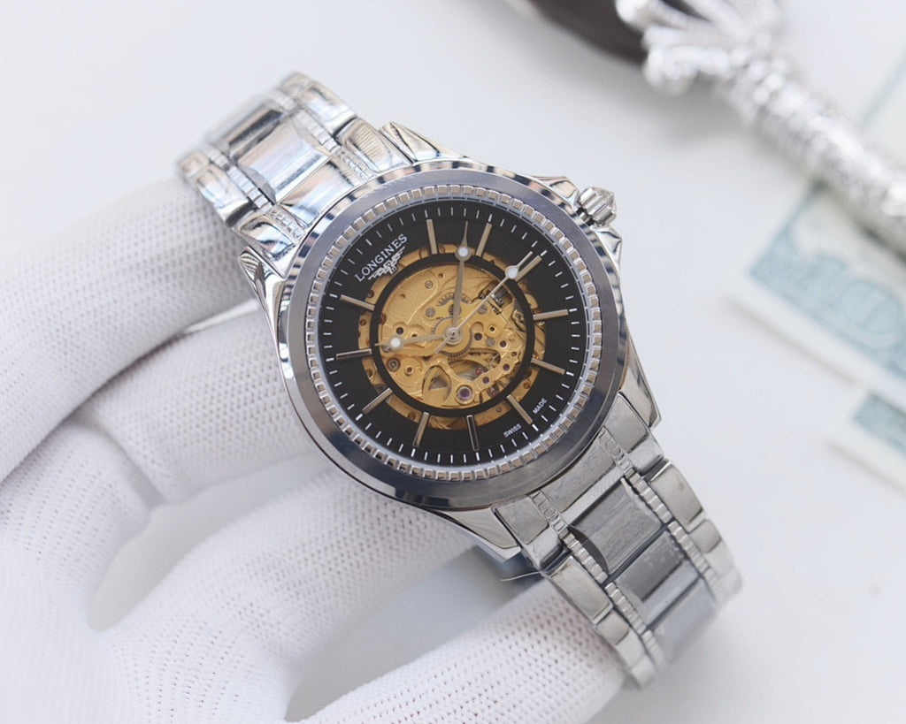Longines skeleton watch, silver-tone case, dark dial, gold-toned movement, metal bracelet