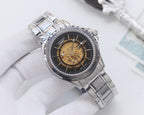 Longines skeleton watch, silver-tone case, dark dial, gold-toned movement, metal bracelet