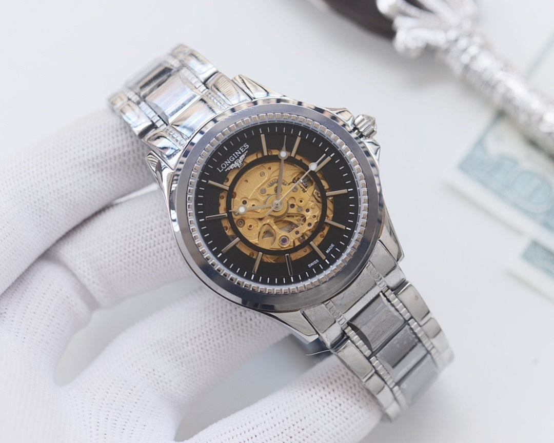 Longines skeleton watch, silver-tone case, dark dial, gold-toned movement, metal bracelet