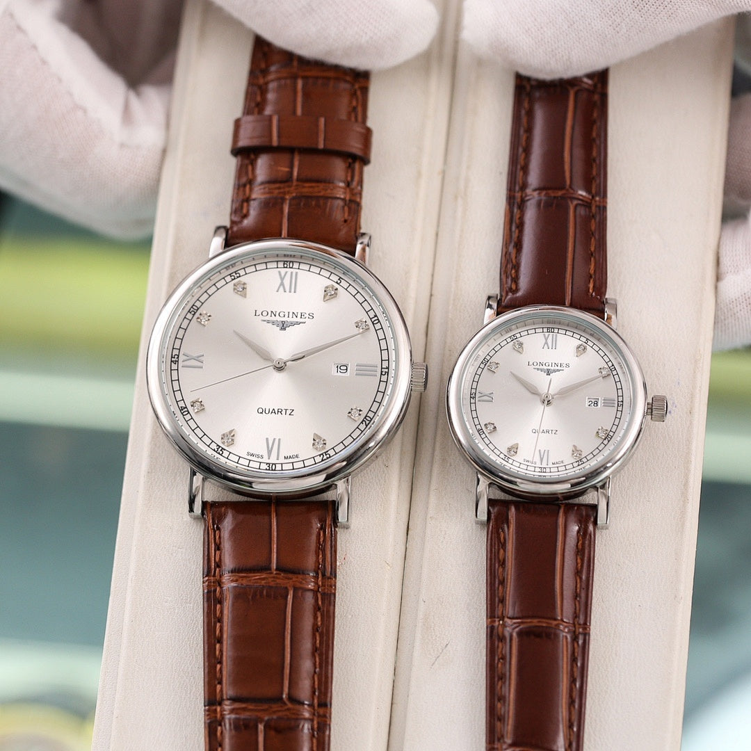 Longines quartz wristwatch set with silver dial and brown leather straps, Roman numerals