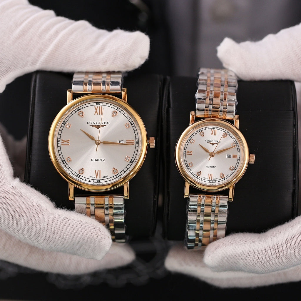 Longines quartz wristwatch with white dial, silver-tone bracelet, and gold-tone case