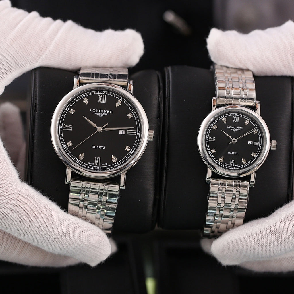 Longines quartz wristwatch with black dial and silver-tone metal bracelet, Roman numerals