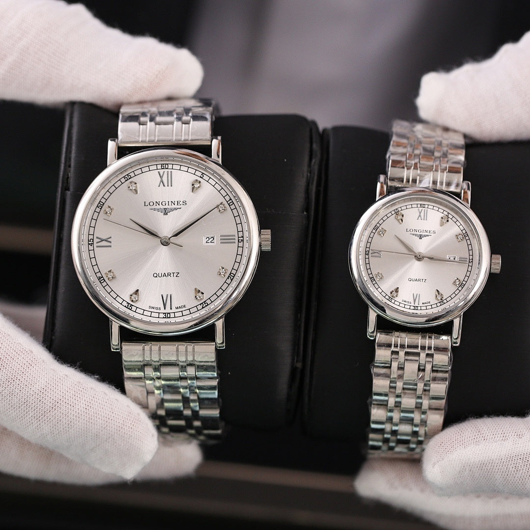 Longines quartz wristwatch with white dial and silver-tone metal bracelet, Roman numerals
