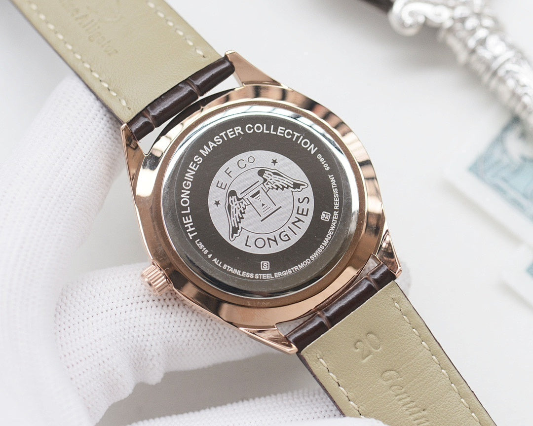 Rose gold watch case back with engraved emblem, beige leather strap, metal crown