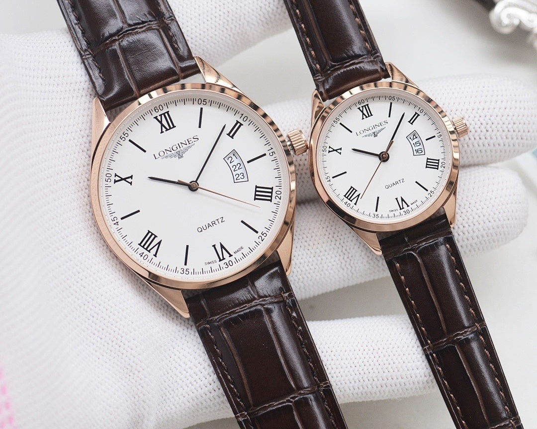 Two white dial quartz watches with Roman numerals, rose gold cases, black leather straps