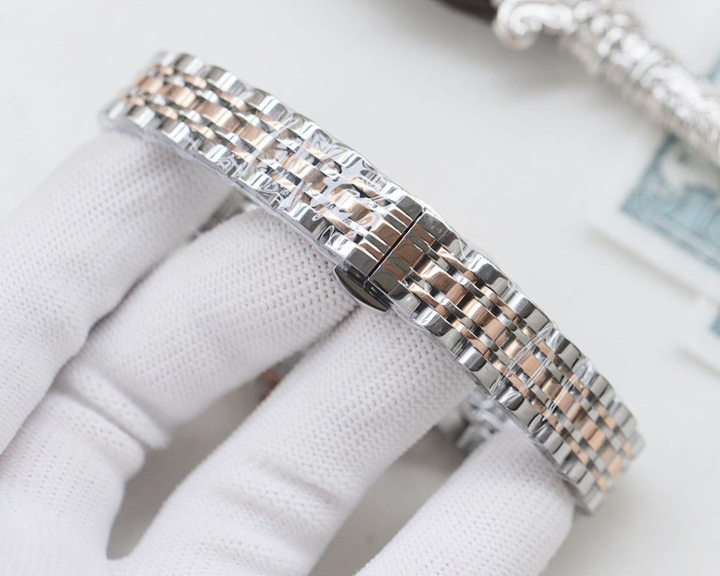 Longines metal bracelet link detail on wristwatch