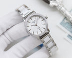 Longines stainless steel wristwatch with white dial and steel bracelet