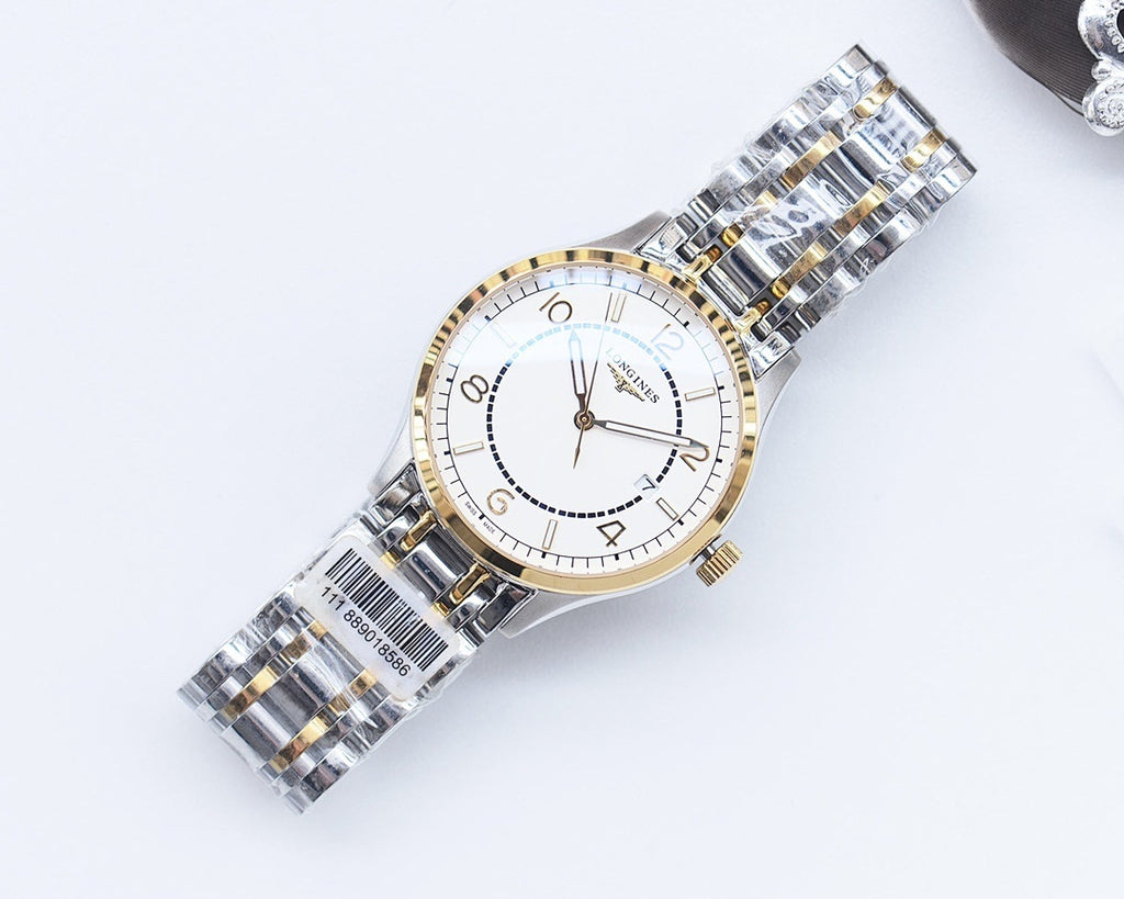 Two-tone Longines watch with silver bracelet, white dial, gold bezel accents and hands.