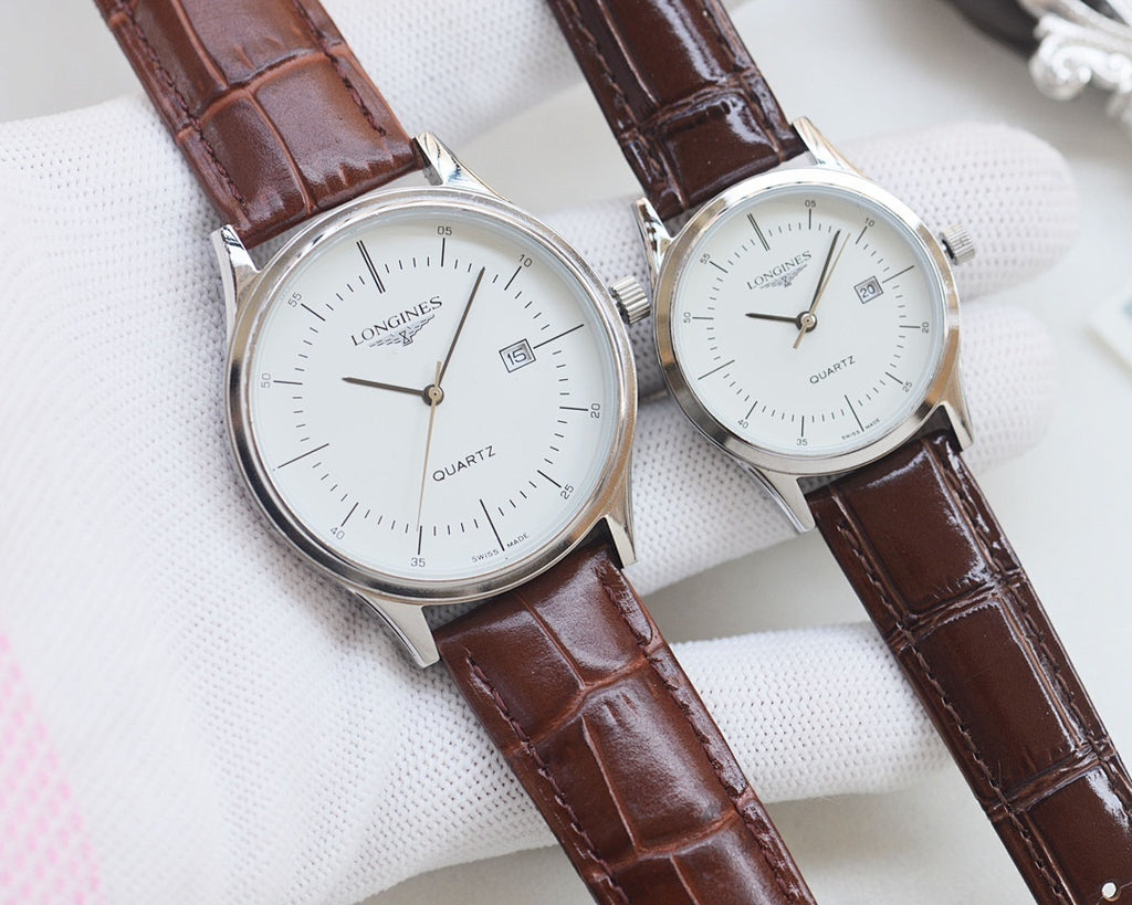 Pair of quartz wristwatches with white dials and brown leather strap
