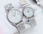 Pair of quartz wristwatches with white dials and silver metal bracelet straps