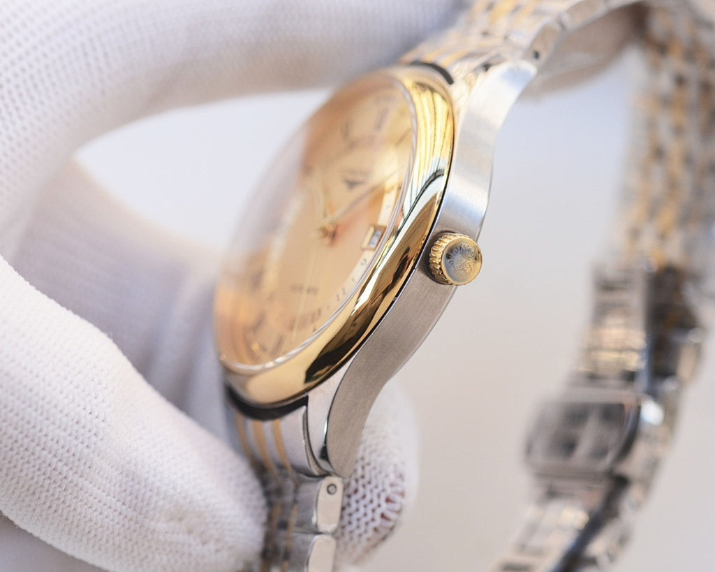 Two-tone stainless steel watch, gold dial and crown with bracelet