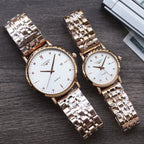 Longines quartz watch pair with two-tone metal bracelet and white dial, round cases, markers