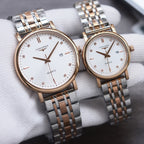 Longines quartz watch pair with two-tone bracelet and white dial, round cases, baton markers